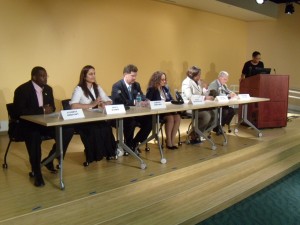 Panelists and moderator onstage.